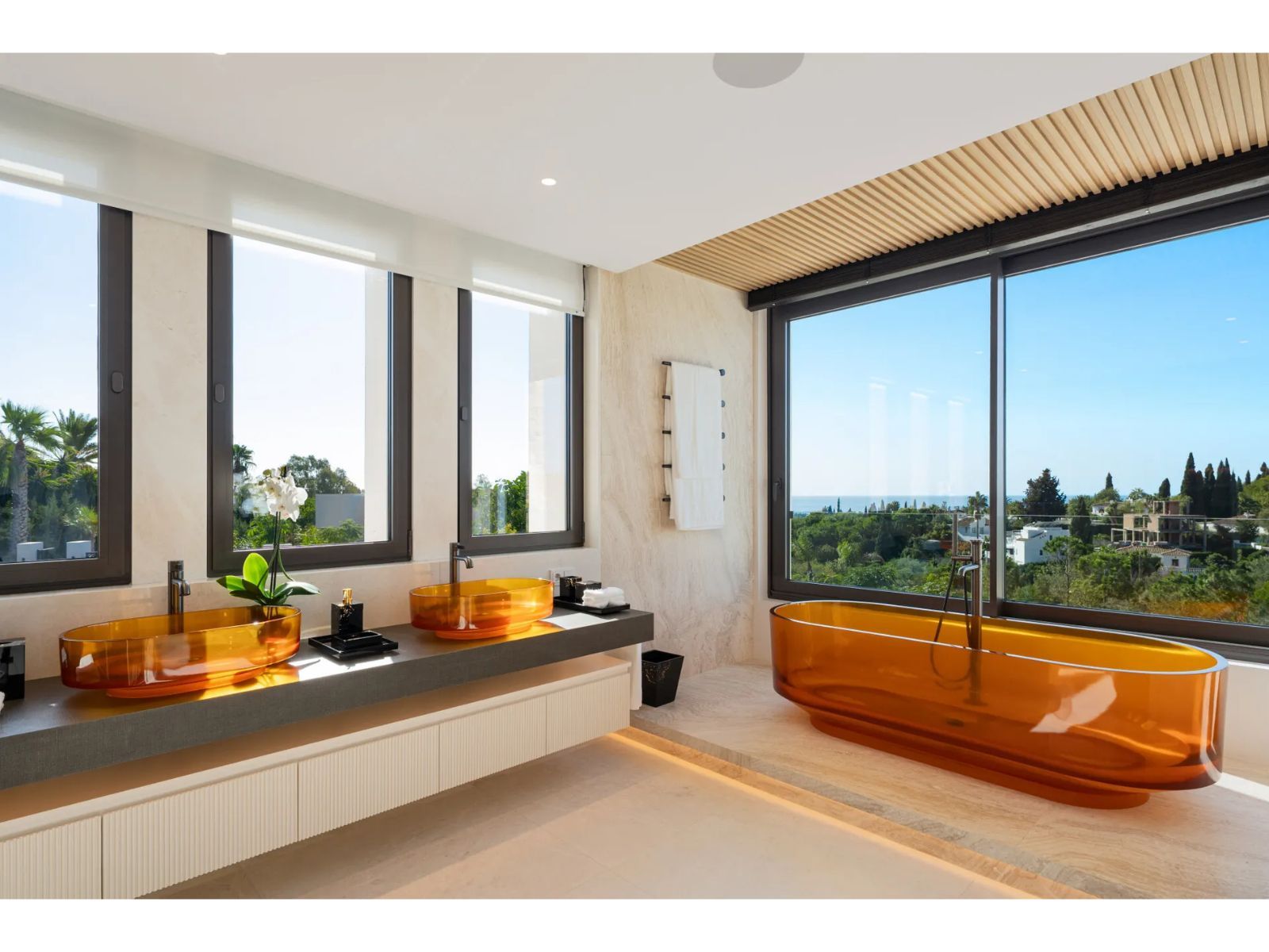 04 modern bathroom orange tub ocean view